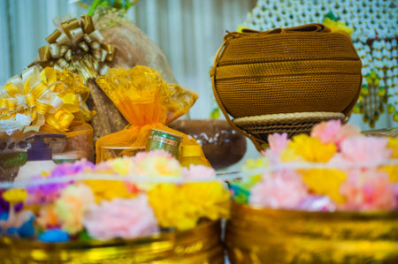 Thai style offerings in the temple, Thailand. Selective focus.