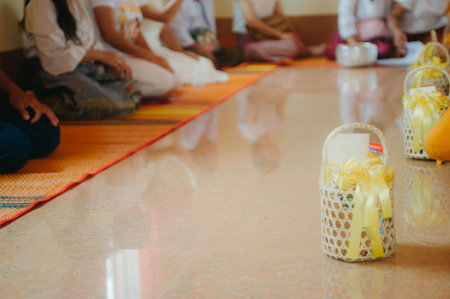 Thai people practicing yoga on the mat in the temple, stock photo