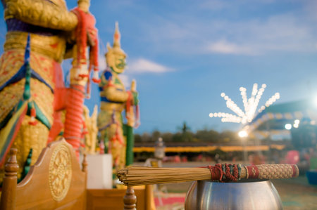 Buddhist statue in the temple, blurred background with bokehの写真素材