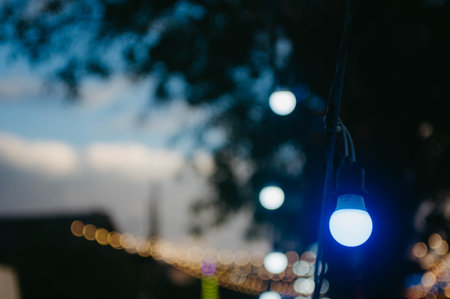 Blurred image of street lights with bokeh light background.