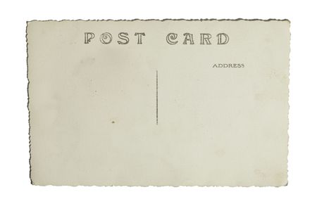 back side of an old post card, isolated on whiteの写真素材