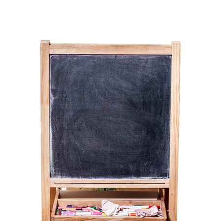 Empty Wooden Black Board  with chalks in White Background, copy spaceの写真素材