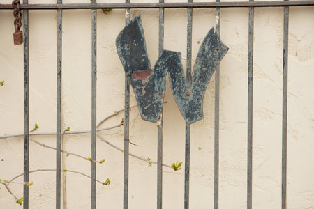 Letter W on Metal Gateの写真素材