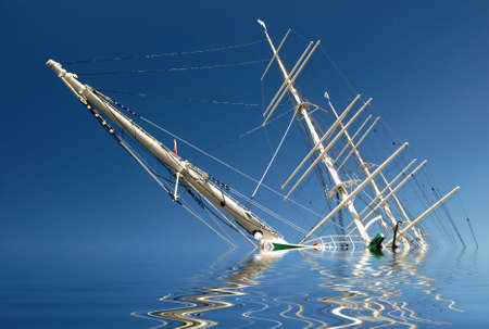 Sinking sailing ship in front of blue sky.の写真素材