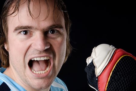 Goalkeeper after holding a ball. Studio pictureの写真素材