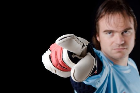 Goalkeeper gives directions. Studio pictureの写真素材