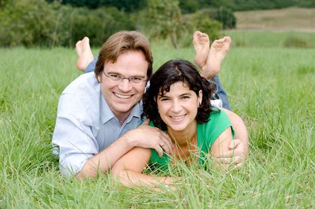 Young couple on a farmerÂ´s meadow. の写真素材