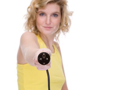 Full isolated portrait of a beautiful  caucasian woman with a power cableの写真素材