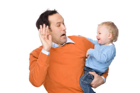 Full isolated studio picture from a young father with his sonの写真素材