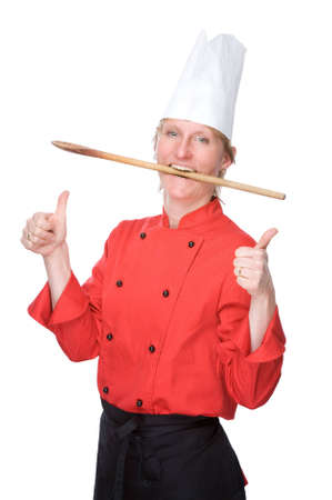 Full isolated studio picture from a young cook with thumbs upの写真素材