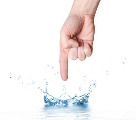 Full isolated studio picture from a human hand with some waterの写真素材
