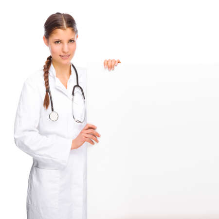 Full isolated portrait of a beautiful caucasian doctorの写真素材