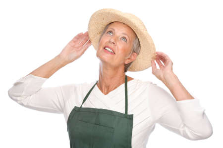 Full isolated portrait of a senior gardenerの写真素材