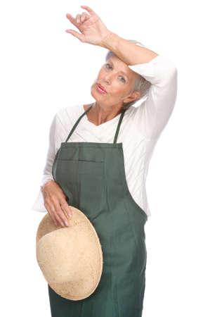 Full isolated portrait of a senior gardenerの写真素材