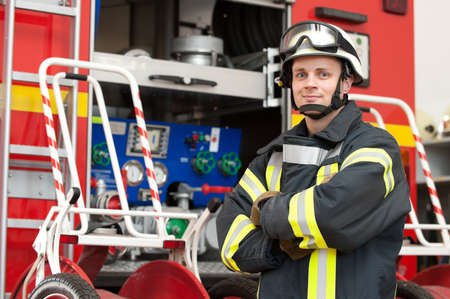Picture from a young and successful firefighter at workの写真素材