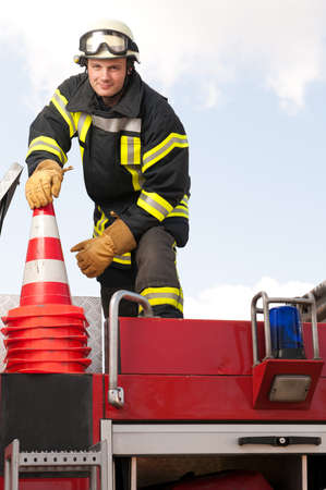 Picture from a young and successful firefighter at workの写真素材