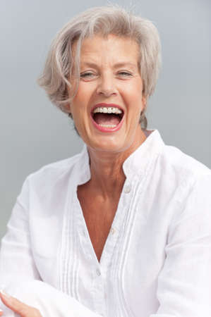 Active and happy senior womanの写真素材