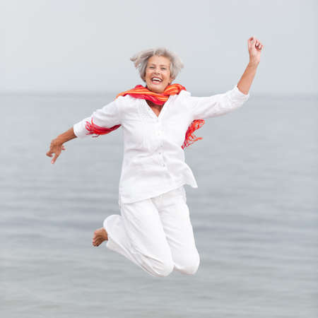 Active and happy senior womanの写真素材