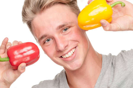 Full isolated studio picture from a happy young man with fruits