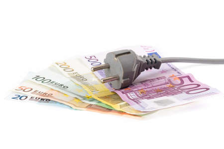 Euro banknotes with cable in front of white backgroundの写真素材