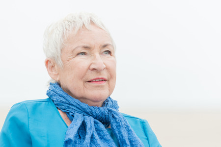 Smililing senior woman with grey hair