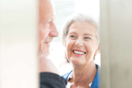 Senior couple call in a phone boxの写真素材
