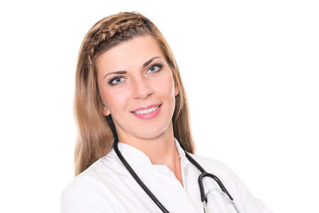 Young doctor in front of white backgroundの写真素材