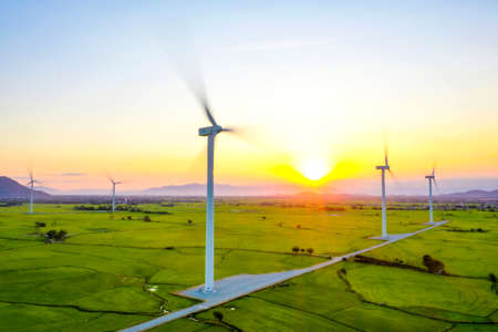 Nice sunset with wind turbine in Ninh Thuan province southern Vietnamの写真素材