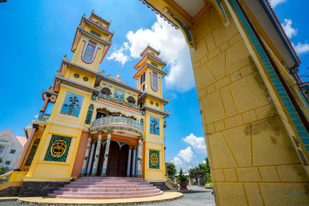 Nice Cao Dai temple with blue sky in Mekong Delta southern Vietnamの写真素材