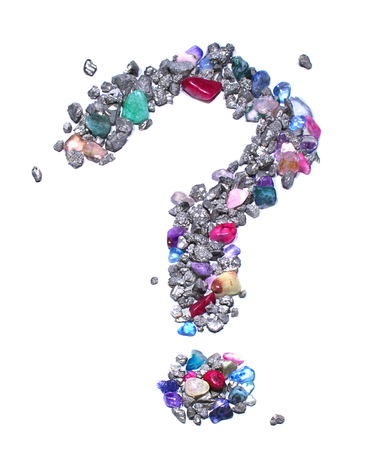 The question mark symbol made out of gems and blue / silver colored metallic rocks (iron pyrite) on a white background. The symbol is bright and colorful, giving the impression of rocks scattered across a surface.の写真素材