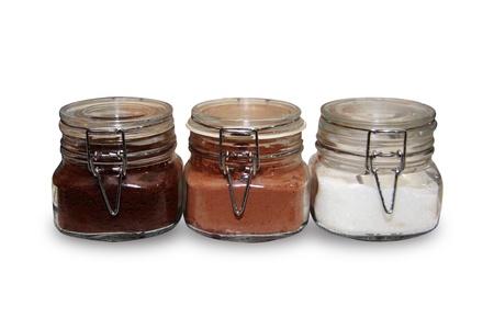 Jars with coffee, Cocoa and Non Dairy Creamer on a white backgroundの写真素材