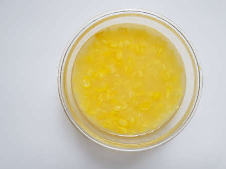 sweet corn soup made by mung bean, corn slices, sticky rice.の写真素材