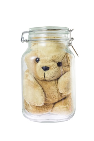Teddy bear in a glass jarの写真素材