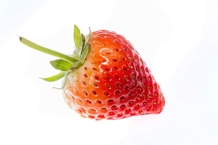 Close-up of fresh strawberries on white backgroundの写真素材