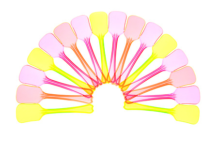 Colorful plastic spoons arranged in a fan.の写真素材