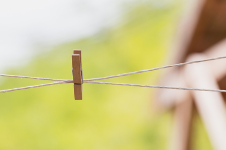 clothespin on rope in natural backgroundの写真素材