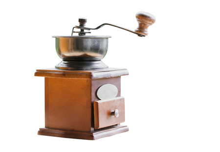 Vintage wooden hand coffee grinder isolated on white backgroundの写真素材