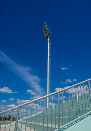 high pole Spotlight Stadium lights with blue sky background.の写真素材