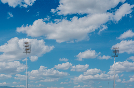 high pole Spotlight Stadium lights with blue sky background.の写真素材