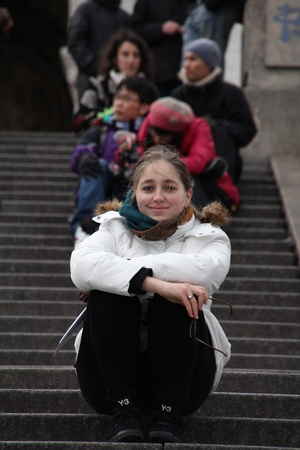 Paris, Montmartre, February 14,  2012 - Young Girl sitting on stepsのeditorial素材