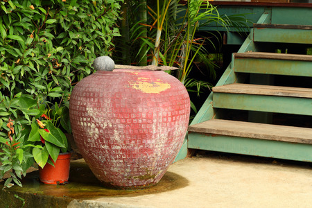Image of top view of big water jar on the ground floor in Thai houseの写真素材