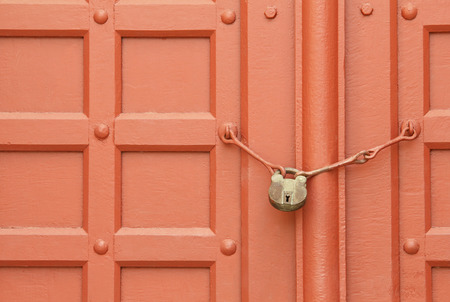 Ancient wooden door with lockの写真素材