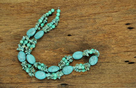 Natural turquoise on old wood backgroundの写真素材