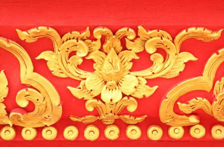 Traditional Thai style flower pattern decorative, stucco gold paint in temple,Thailand.