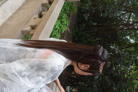 Vietnamese girl in a white dressの写真素材