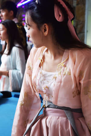 Korean girl in traditional clothes in a partyの写真素材