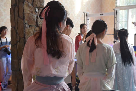 Unidentified women in traditional clothes.の写真素材