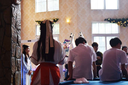 Unidentified people in traditional costume during ceremony.の写真素材