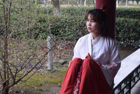 Japanese woman in a kimono with a red kimonoの写真素材