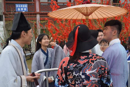 Japanese people in traditional costume at the Shinto shrine.の写真素材